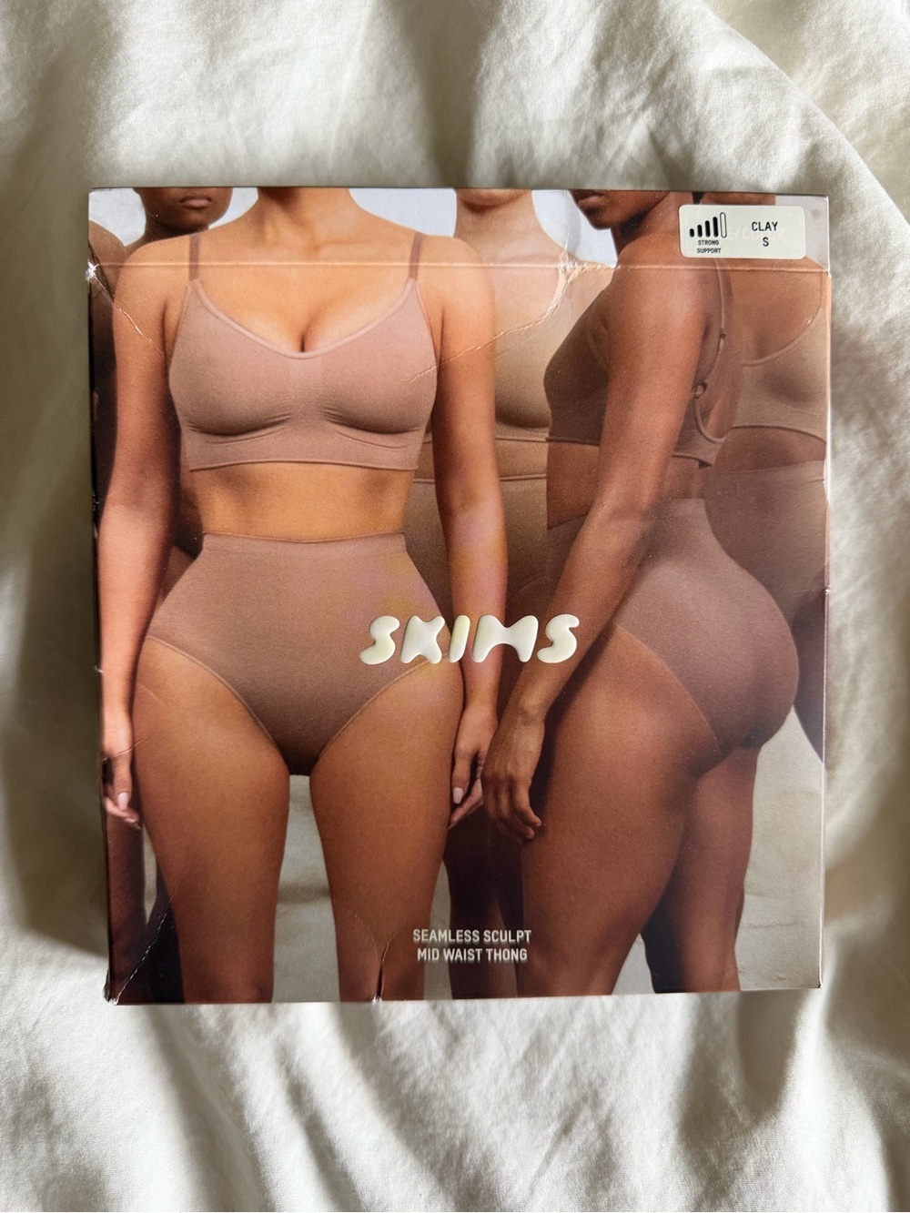 SKIMS Seamless Sculpt Mid Waist Thong in Clay Small